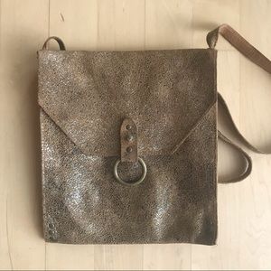 Gold treated handmade leather bag. KBD Studio Los Angeles.